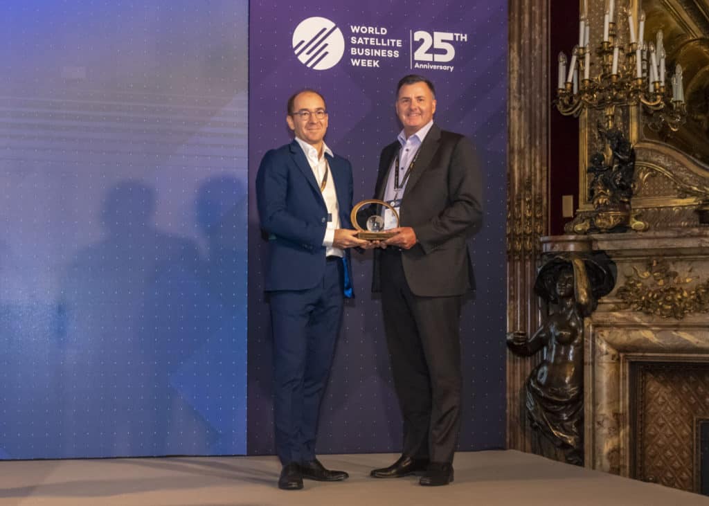 Euroconsult CEO Pacôme Révillon posing with BlackSky CEO Brian O’Toole with the Pioneer in Space Business Award at World Satellite Business Week (WSBW) 2022 