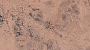 Convoy of intergovernmental vehicles in an overnight formation in Mali during a hazardous operation.
